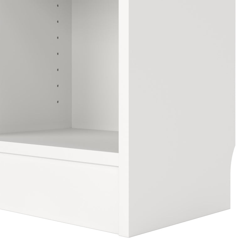 Basic Tall Narrow Combination Storage Bookcase in White (4 Shelves) with Glass White Door — room setting
