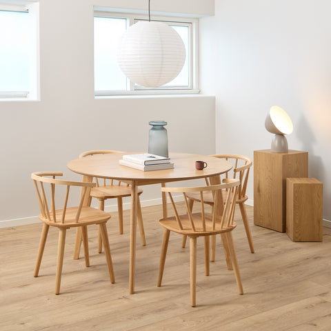 Nagano Round Dining Table in Oak 120cm includes 4 Ida Dining Chairs in Oak — front view
