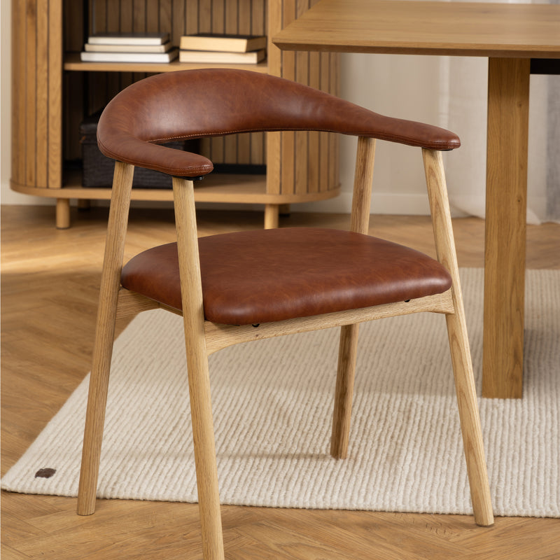 Addi Dining Chair With Armrest in PU Retro Brandy Set of 2 — lifestyle setting