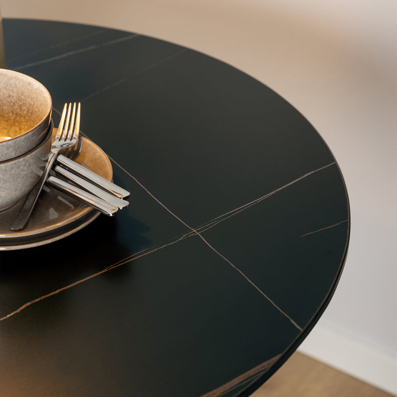 Malta Ceramic Round Dining Table in Black 90cm includes 4 Celia Dining Chairs in Light Grey — detail view